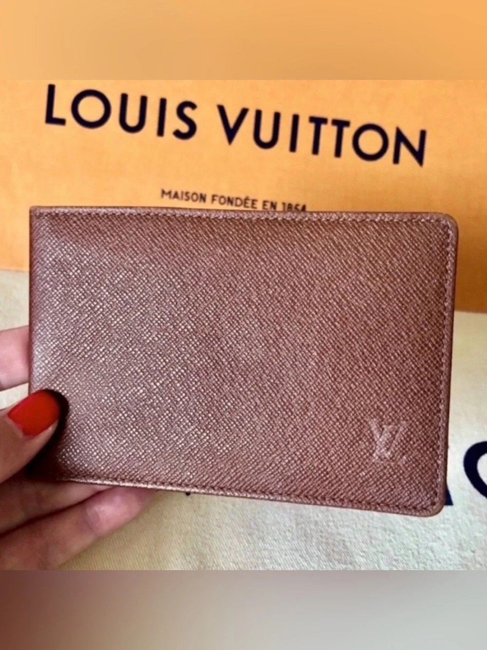 LOUIS VUITTON brown multiple bifold wallet in durable Taiga cross-grain leather